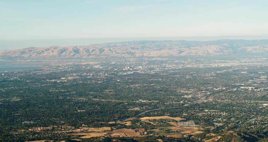 Towns and a city fill a sprawling mountain valley
