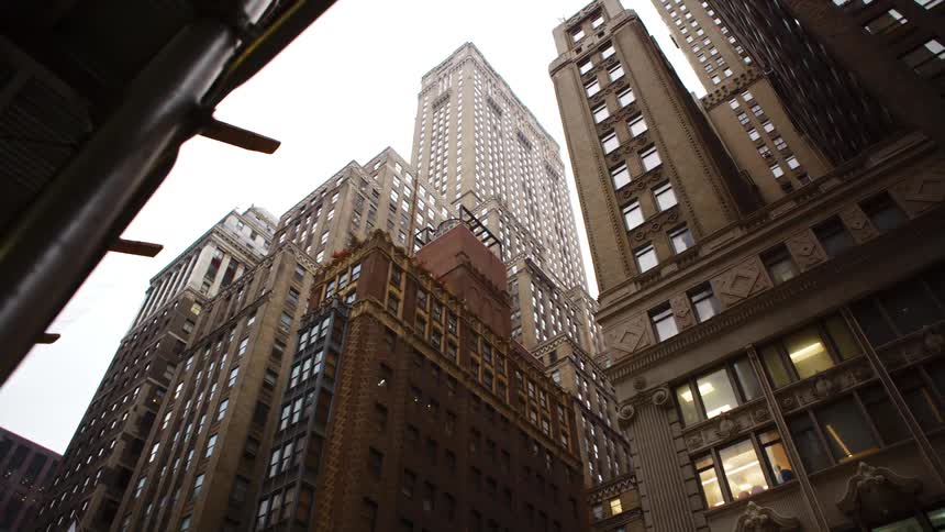 Tall skyscrapers in new york city in an overcast day