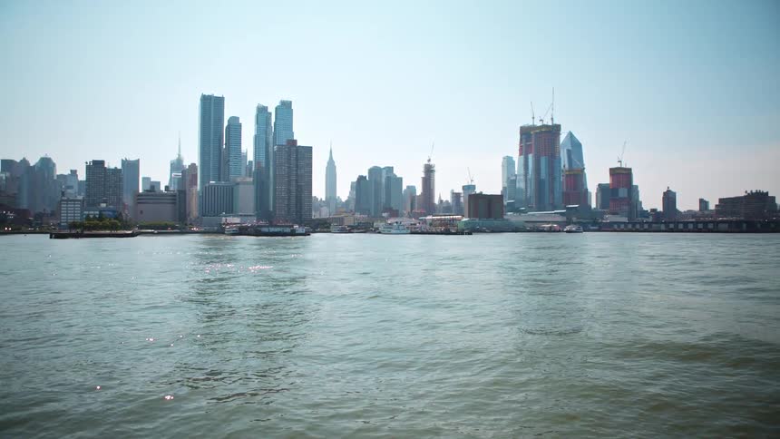 The coast of a metropolis on a sunny day