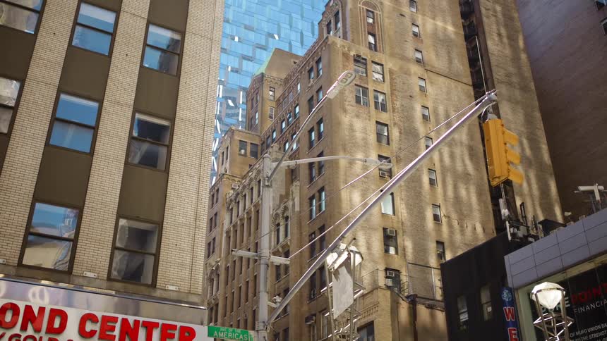 City street with tall buildings and shops in downtown