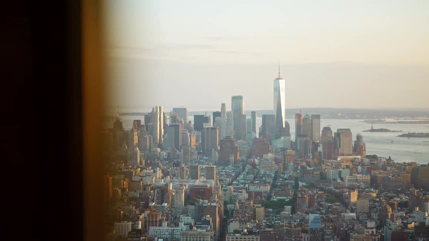 One world trade center in downtown new york city at sunset