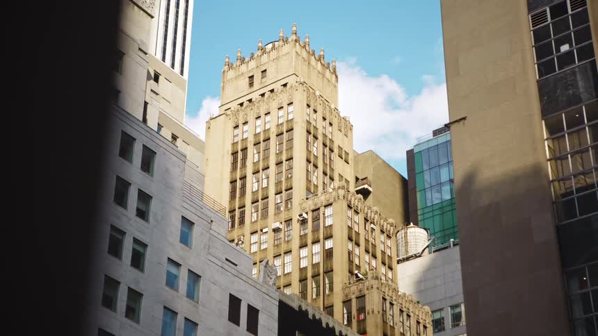 Large white cloud sits over buildings downtown