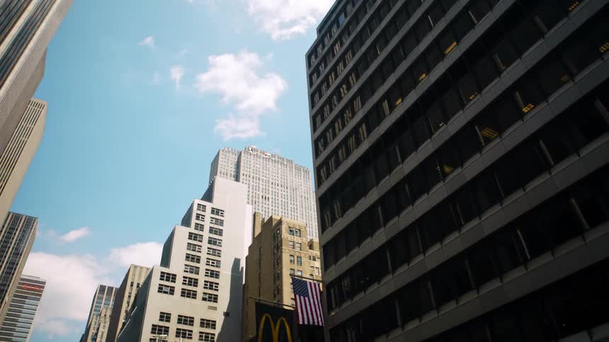 City street with tall office buildings in downtown