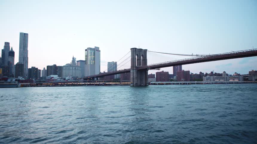 The brooklyn bridge in new york city at sunrise