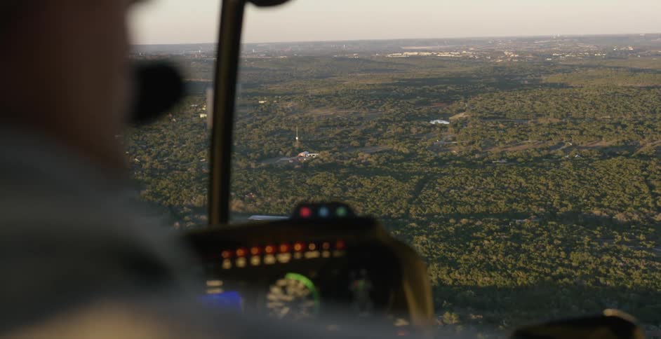 View of the ground from a helicopter cockpit