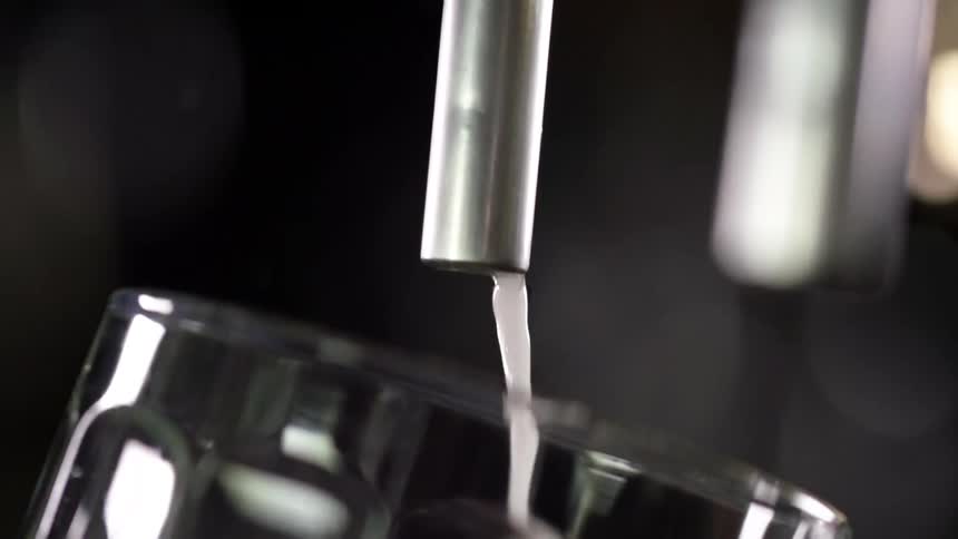 The tap is pouring into the glass