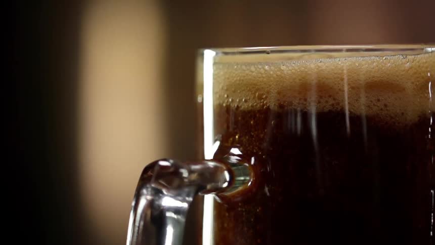 The mug is filled with beer