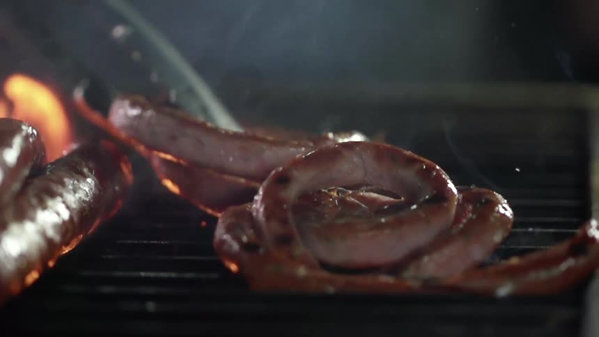 Sausage is being cooked on the grill