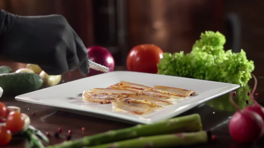 A person plates food