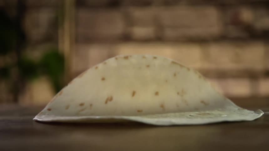 Lavash bread falls on the table