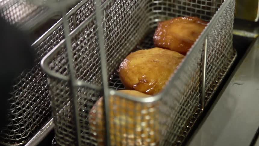 Food is cooked in a deep fryer