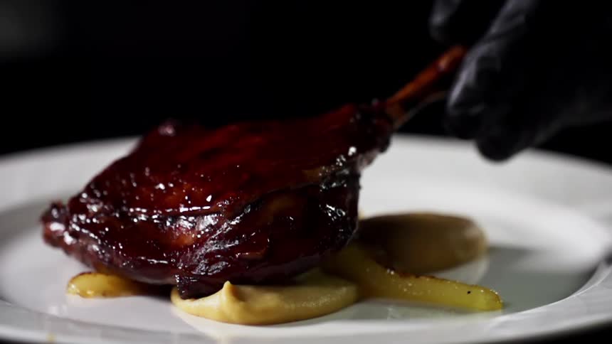 A piece of meat is placed on the dish