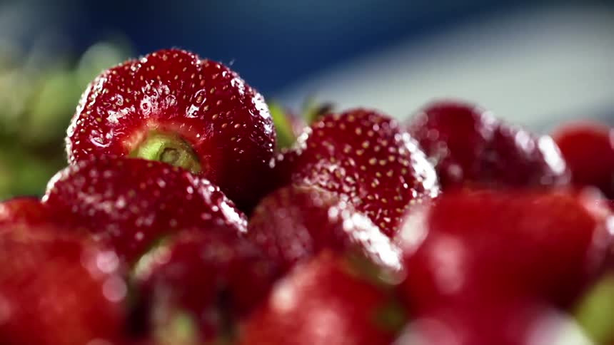 Close up of hulled fresh red strawberries