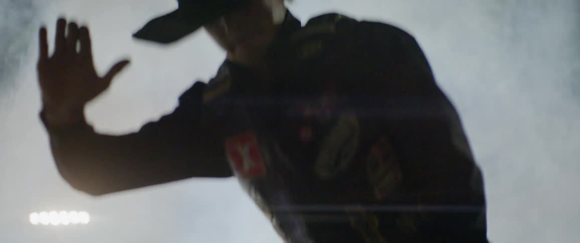 A bull rider tries to stay on during a rodeo