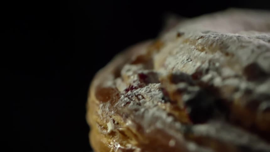 A pastry is dropped on the table