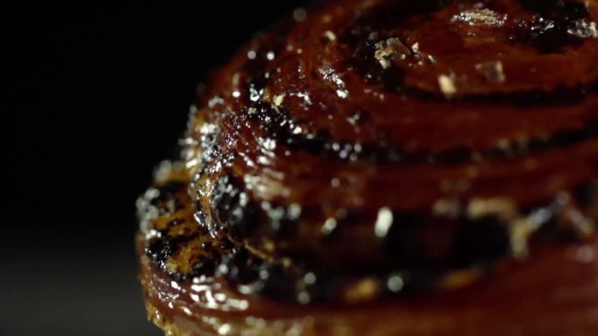 Close up of a glazed sweet baked roll