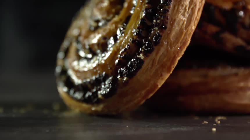 A baked dessert falls onto a table