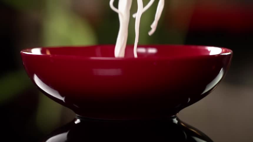 Noodles going in to a bowl