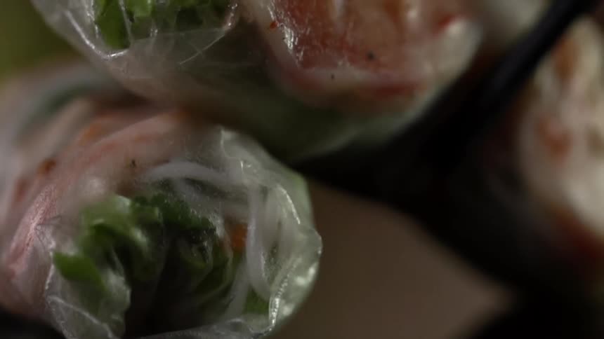 Egg rolls are stacked on the table