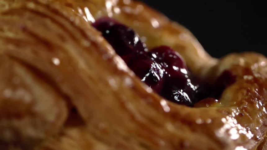 Close up of a pastry with fruit on it