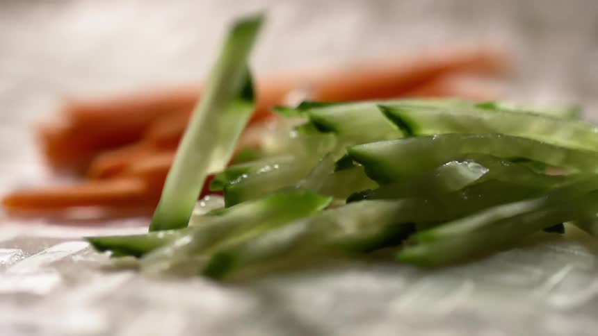 Carrots and cucumbers on paper