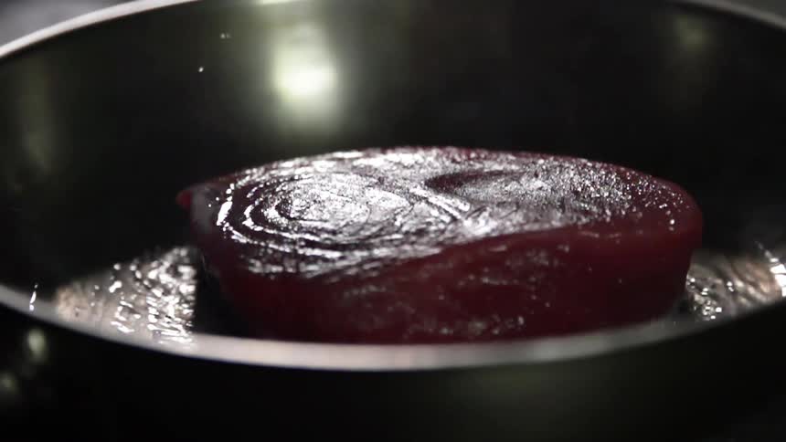 Meat frying in a pan