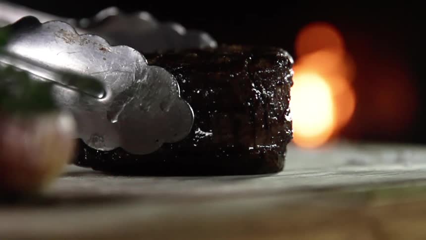A piece of steak is placed on the board