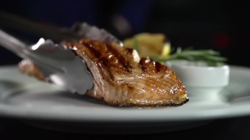 A piece of fish is placed on the plate