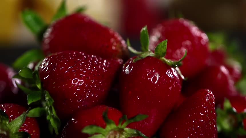 A pile of red juicy strawberries
