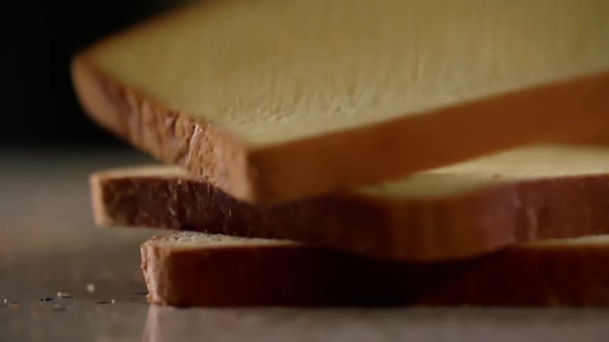 A slice of bread lands and bounces