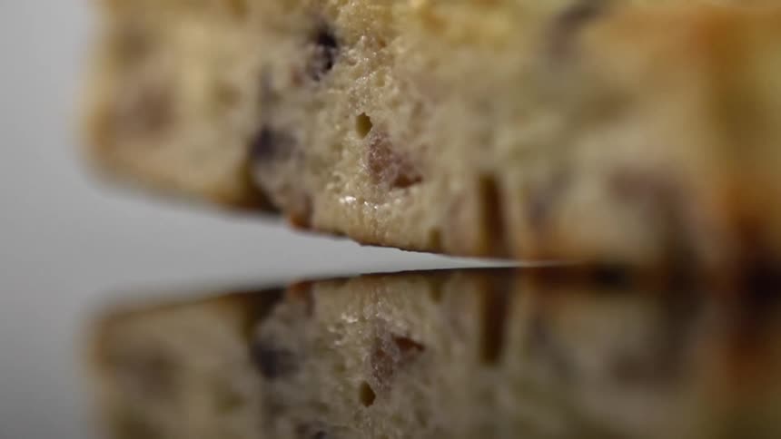 Two pieces of cake fall together