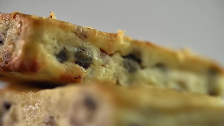 A baked good falls on top of another
