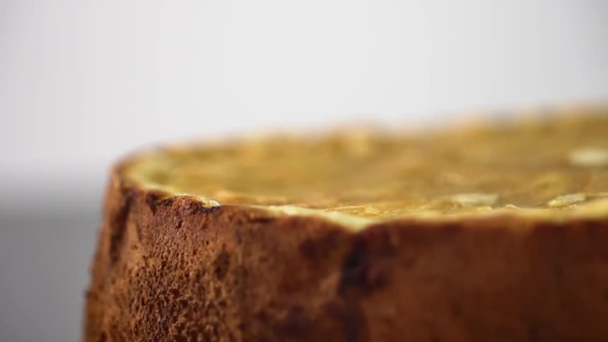 A piece of bread with a dark crust