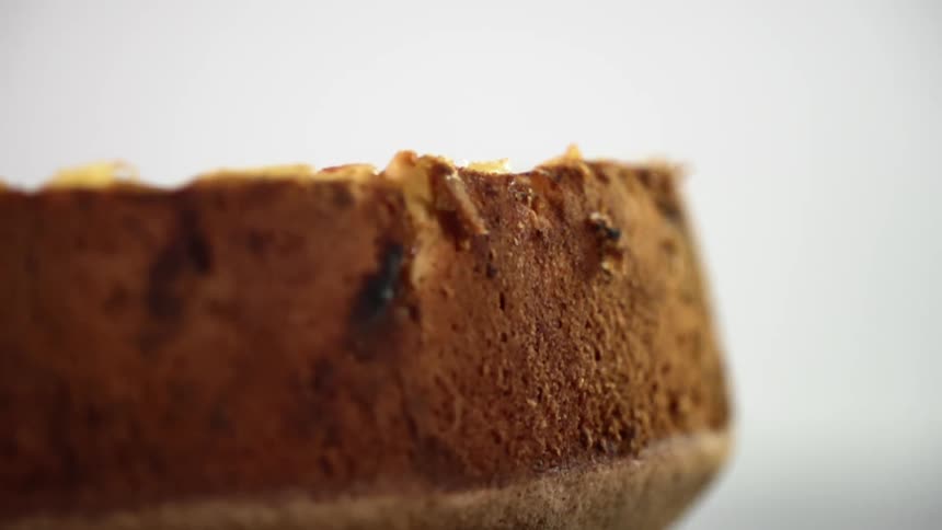 Close up of a baked delicious cake on a white background