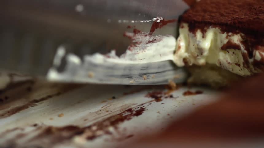 A slice of cake is sliced