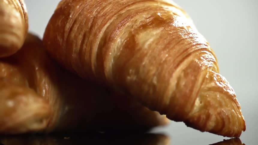 Close up of crescent shaped fluffy croissants