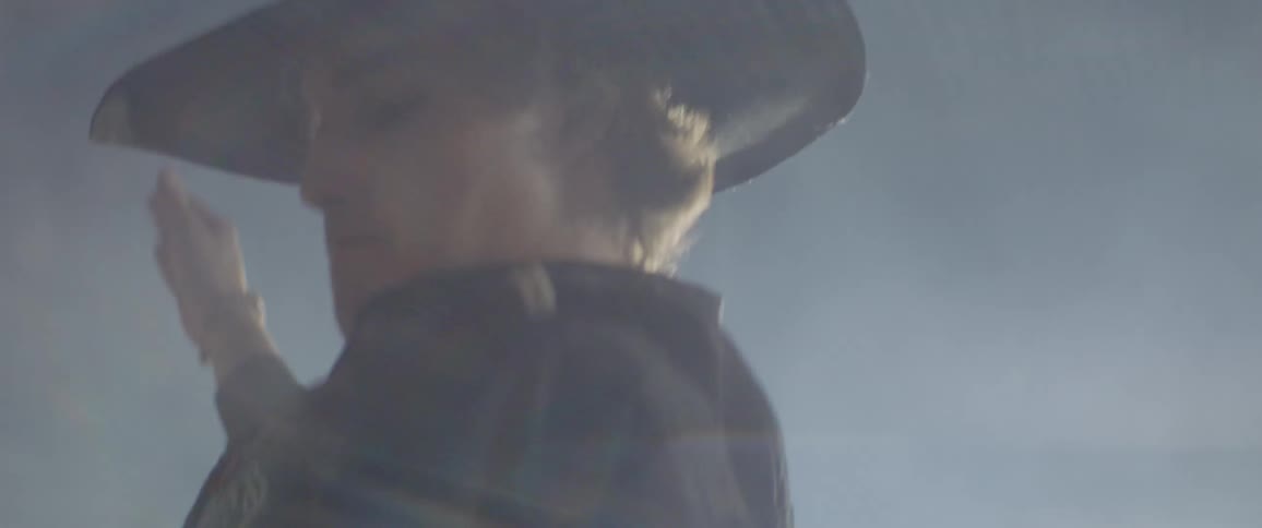 The rodeo rider moves in the fog
