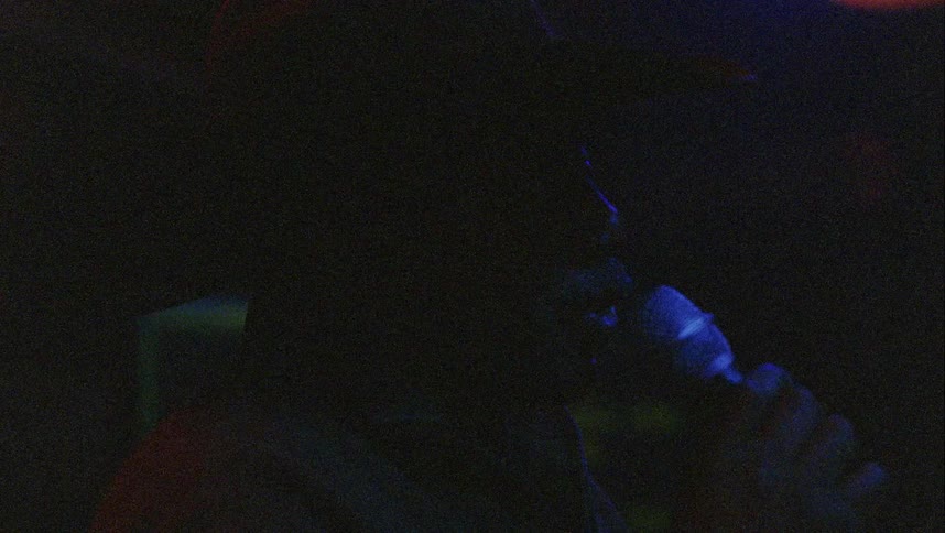 A man singing in a night club