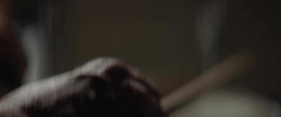 A person plays a drum