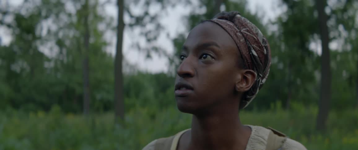 Woman hikes alone in a forest