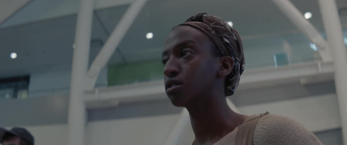 Woman stands in an airport
