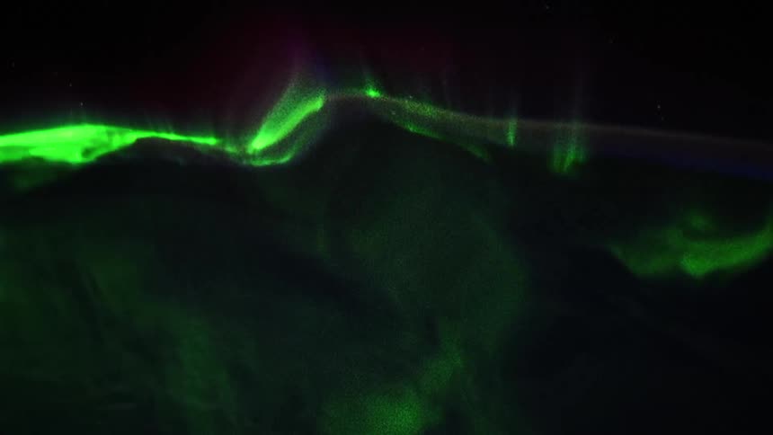 The green northern lights move in the sky