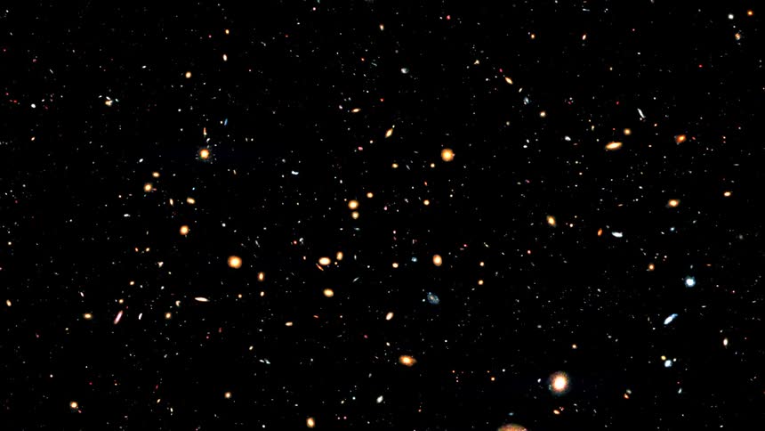 Particles are suspended in darkness