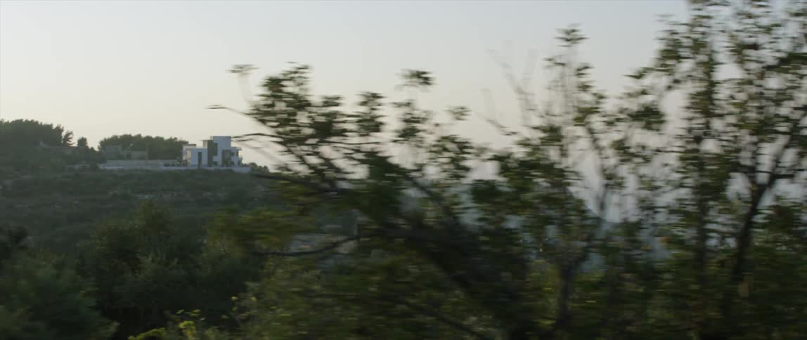 A mountain village as seen from the road