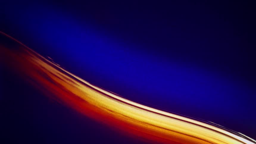 A blue and gold flowing liquid