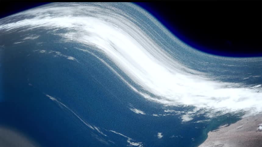 The land below from space is swirling