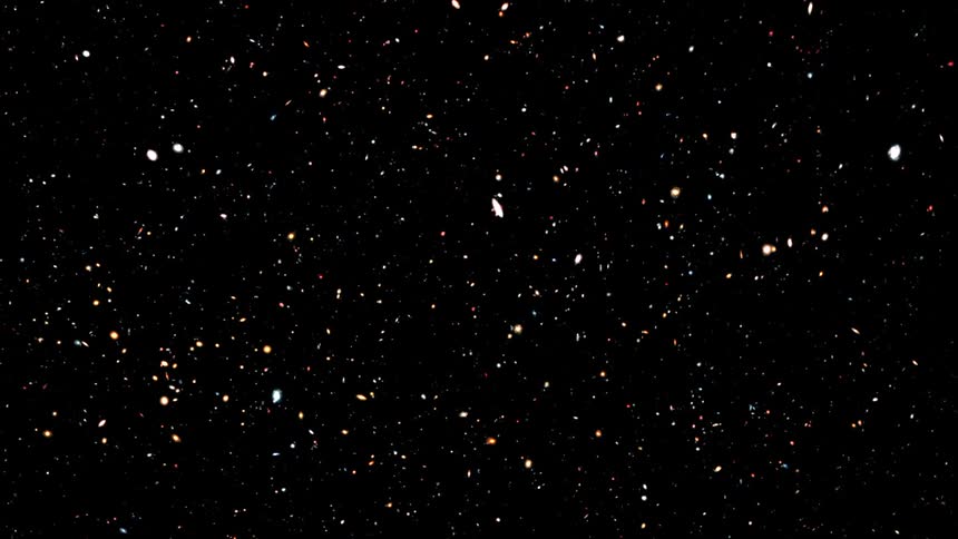 Lights move and flow across black expanse