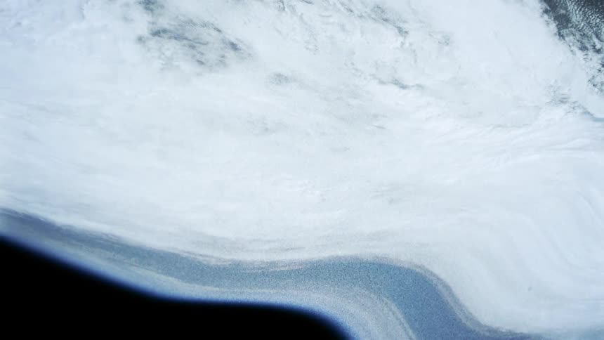 The surface of the earth appears to wave and morph against space