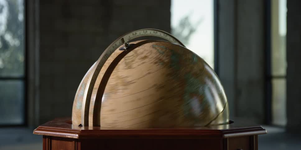World globe earth rotates fast with brown maps