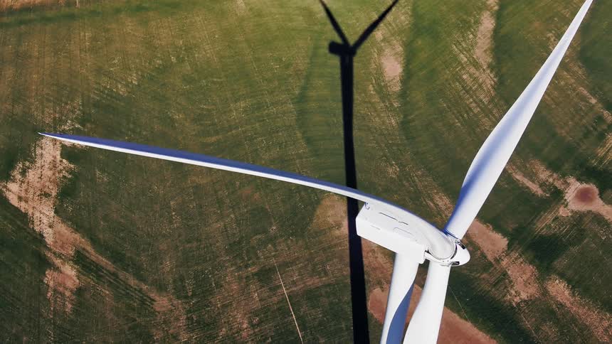 A wind turbine in a field